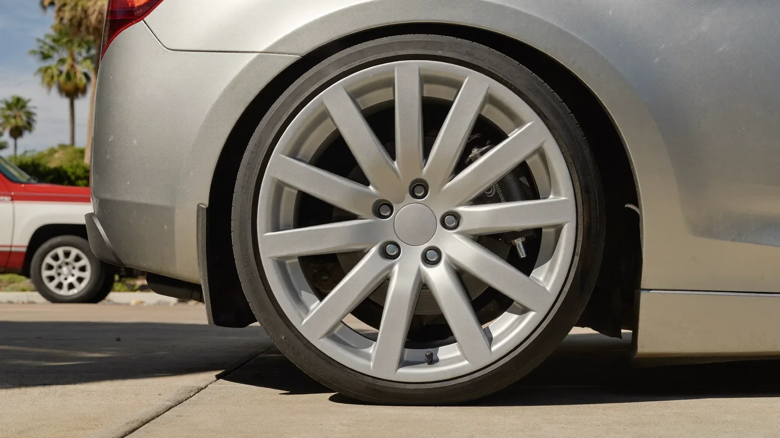 Close-up of a clean alloy wheel and tire on a car in the Florida Keys
